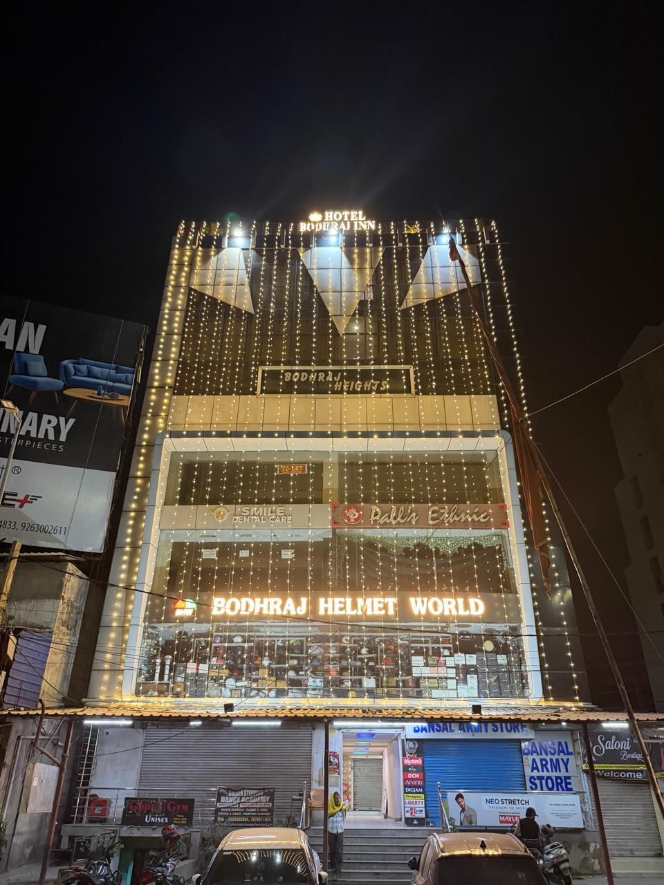 Hotel Bodhraj Inn building exterior at night